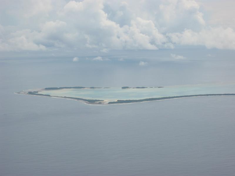 tuv14b The small enclosed lagoon at the southern tip of the Funafuti atoll. A few tens of people live in the secluded village of Funafala.